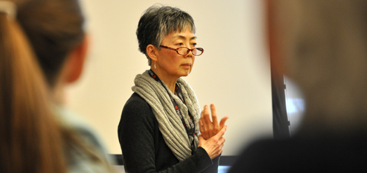 Geraldine Wu, MD, explains the tenets and benefits of mindfulness at the inaugural Resolve to Get Healthy at the Kingsgate Marriott. Photo by Cindy Starr.